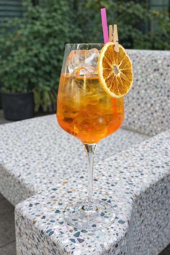 Citrus Huis dried orange slices in a jar, showing vibrant orange color and thin, circular slices ideal for snacks or decor.