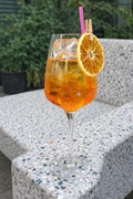 Dried orange slices in a jar from Citrus Huis, 80g, showcasing vibrant orange color and textured surface for snacking or decor.