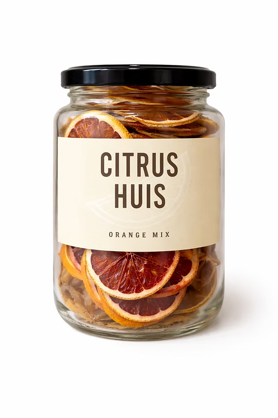 Jar of Citrus Huis Dried Orange Mix, 80g, showcasing vibrant dried orange slices and fruit pieces in a clear container.
