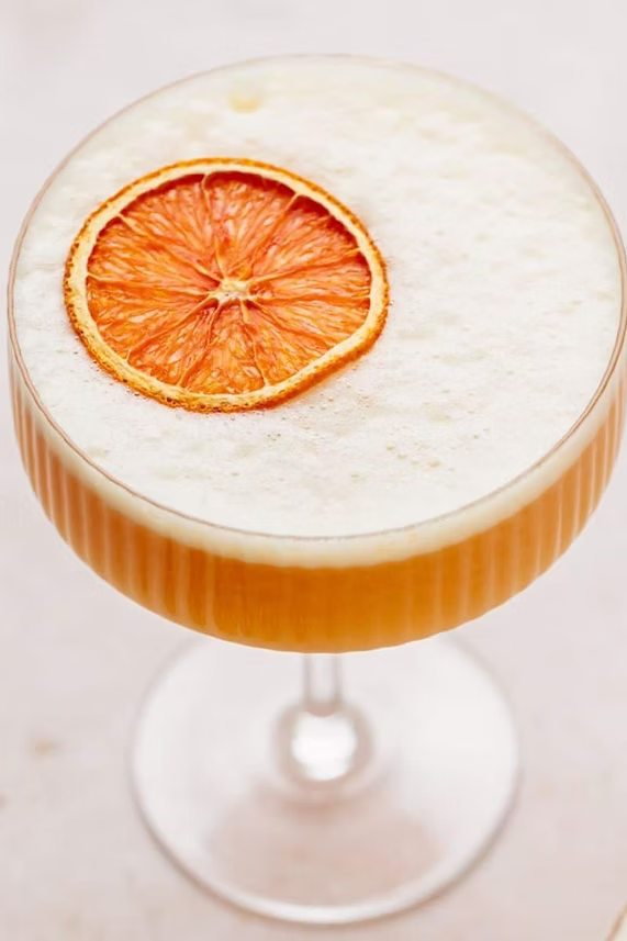 Citrus Huis dried orange mix in a jar, showcasing vibrant orange slices and dried citrus pieces, 80g serving size.